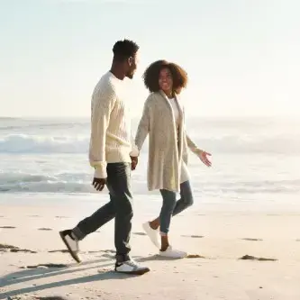 Couple talking on the beach